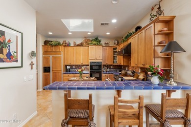 Warm and inviting, this single-level Columbia townhome is on The Country Club At DC Ranch in Arizona - for sale on GolfHomes.com, golf home, golf lot
