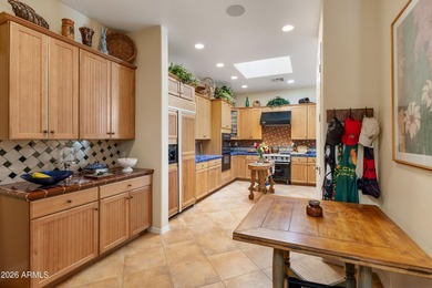 Warm and inviting, this single-level Columbia townhome is on The Country Club At DC Ranch in Arizona - for sale on GolfHomes.com, golf home, golf lot