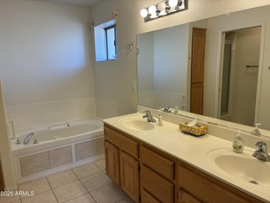 Beautiful kitchen designed for the wife, her desk, her laundry on Sunland Springs Golf Course  in Arizona - for sale on GolfHomes.com, golf home, golf lot