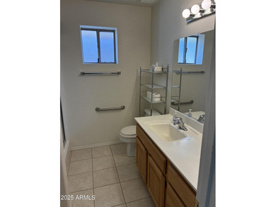 Beautiful kitchen designed for the wife, her desk, her laundry on Sunland Springs Golf Course  in Arizona - for sale on GolfHomes.com, golf home, golf lot