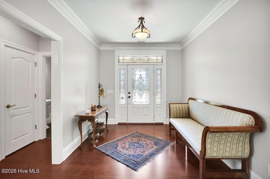 Quality and beauty combine in this elegant home located in the on Compass Pointe Golf Course in North Carolina - for sale on GolfHomes.com, golf home, golf lot