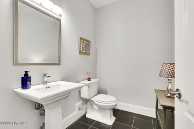 Quality and beauty combine in this elegant home located in the on Compass Pointe Golf Course in North Carolina - for sale on GolfHomes.com, golf home, golf lot