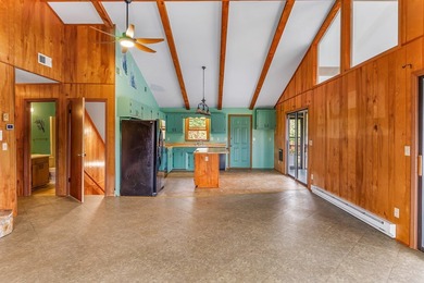 Tucked inside Mill Creek, this inviting mountain retreat is all on Mill Creek Country Club in North Carolina - for sale on GolfHomes.com, golf home, golf lot