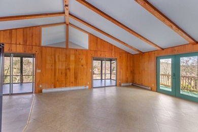 Tucked inside Mill Creek, this inviting mountain retreat is all on Mill Creek Country Club in North Carolina - for sale on GolfHomes.com, golf home, golf lot