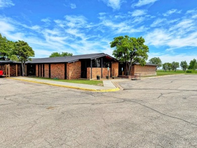 This versatile commercial property offers a unique opportunity on Perryton Municipal Golf Course in Texas - for sale on GolfHomes.com, golf home, golf lot