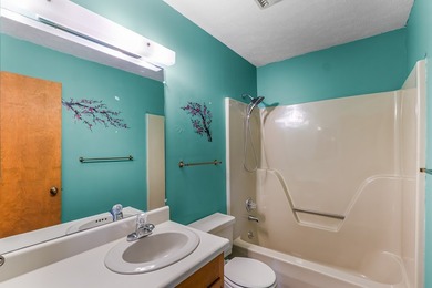 Tucked inside Mill Creek, this inviting mountain retreat is all on Mill Creek Country Club in North Carolina - for sale on GolfHomes.com, golf home, golf lot