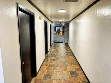 This versatile commercial property offers a unique opportunity on Perryton Municipal Golf Course in Texas - for sale on GolfHomes.com, golf home, golf lot