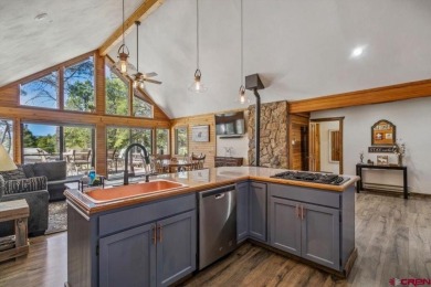 Mountain Living Meets the Golf Course! Huge deck just off the on Pagosa Springs Golf Club in Colorado - for sale on GolfHomes.com, golf home, golf lot