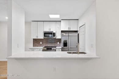 Low maintenance living in sunny St Augustine! Ground floor end on St. Augustine Shores Golf Club in Florida - for sale on GolfHomes.com, golf home, golf lot