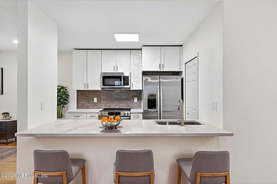 Low maintenance living in sunny St Augustine! Ground floor end on St. Augustine Shores Golf Club in Florida - for sale on GolfHomes.com, golf home, golf lot