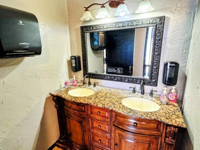 This versatile commercial property offers a unique opportunity on Perryton Municipal Golf Course in Texas - for sale on GolfHomes.com, golf home, golf lot