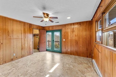 Tucked inside Mill Creek, this inviting mountain retreat is all on Mill Creek Country Club in North Carolina - for sale on GolfHomes.com, golf home, golf lot