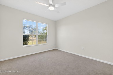 Low maintenance living in sunny St Augustine! Ground floor end on St. Augustine Shores Golf Club in Florida - for sale on GolfHomes.com, golf home, golf lot