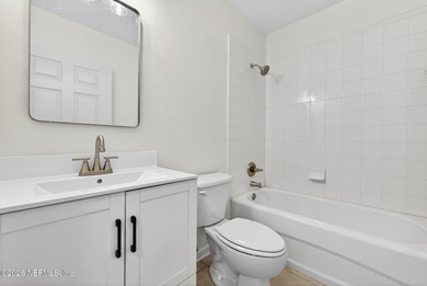 Low maintenance living in sunny St Augustine! Ground floor end on St. Augustine Shores Golf Club in Florida - for sale on GolfHomes.com, golf home, golf lot