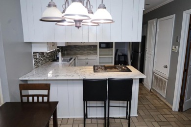 Welcome to this massive, gorgeous, and updated two-story estate on Huntington Park Golf Course in Louisiana - for sale on GolfHomes.com, golf home, golf lot