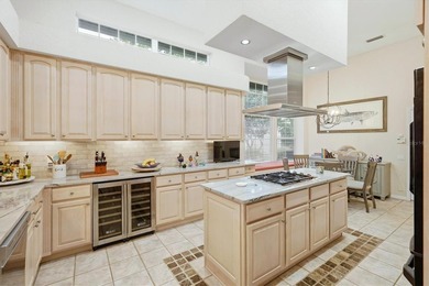 Tucked within the prestigious gates of University Park Country on University Park Country Club in Florida - for sale on GolfHomes.com, golf home, golf lot