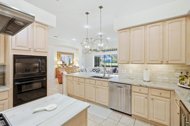 Tucked within the prestigious gates of University Park Country on University Park Country Club in Florida - for sale on GolfHomes.com, golf home, golf lot