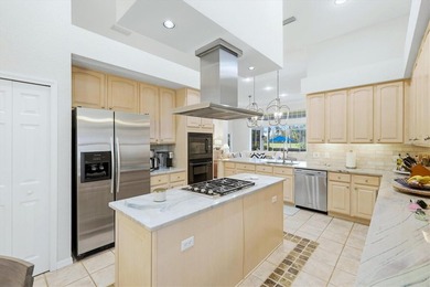 Tucked within the prestigious gates of University Park Country on University Park Country Club in Florida - for sale on GolfHomes.com, golf home, golf lot