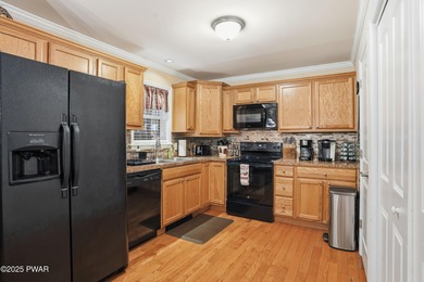 Welcome to your new Poconos getaway! This turn-key ranch in The on The Hideout Golf in Pennsylvania - for sale on GolfHomes.com, golf home, golf lot