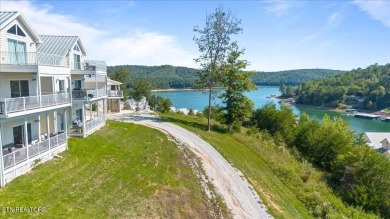 Experience elevated lake living in Deerfield Resort. Built in on The Greens at Deerfield in Tennessee - for sale on GolfHomes.com, golf home, golf lot