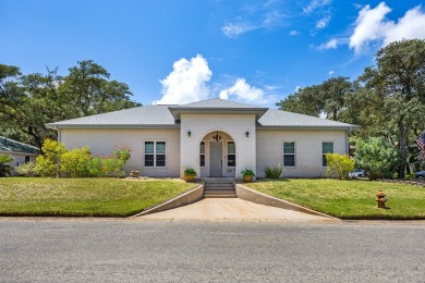 Experience coastal elegance at 101 Bay Hills, Rockport, TX. This on Rockport Country Club in Texas - for sale on GolfHomes.com, golf home, golf lot