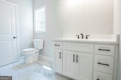 This is a custom home builder. Not your typical spec home! The on Fairfield Plantation Golf and Country Club in Georgia - for sale on GolfHomes.com, golf home, golf lot