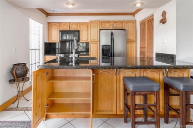 Sandpiper Villa furnished with 2 bedrooms and 2.5 bathrooms with on Santa Lucia River Club in Florida - for sale on GolfHomes.com, golf home, golf lot