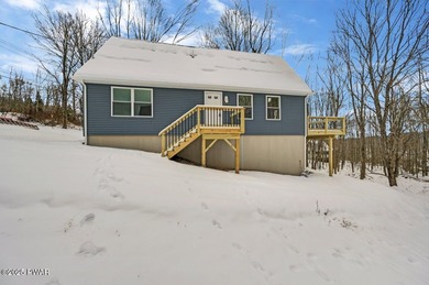 Brand-New Construction with Seasonal Lake Views of Roamingwood on The Hideout Golf in Pennsylvania - for sale on GolfHomes.com, golf home, golf lot