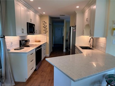 Beautiful updated CBS 2 Bedroom, 2 Bathroom 1671 Sq Ft, Golf on Martin County Golf Course in Florida - for sale on GolfHomes.com, golf home, golf lot