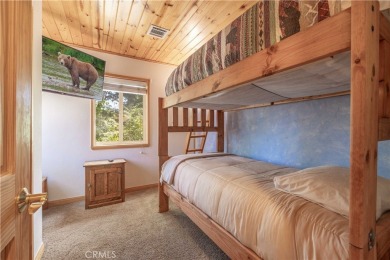 Nestled among the trees in Moonridge, this charming cabin is on Big Bear Mountain Ski and Golf Resort in California - for sale on GolfHomes.com, golf home, golf lot