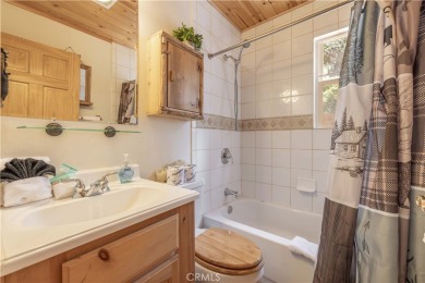 Nestled among the trees in Moonridge, this charming cabin is on Big Bear Mountain Ski and Golf Resort in California - for sale on GolfHomes.com, golf home, golf lot