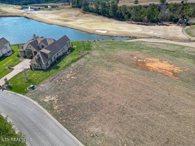 Discover unparalleled beauty within WindRiver Golf and Lakefront on Wind River Golf Course in Tennessee - for sale on GolfHomes.com, golf home, golf lot