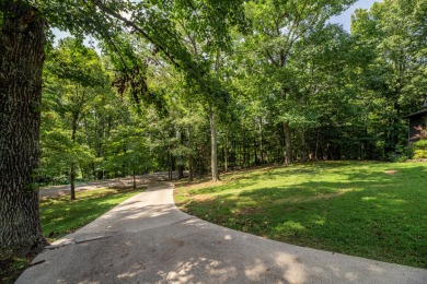 Beautiful home nestled among mature trees giving just enough on Emory Golf and Country Club in Tennessee - for sale on GolfHomes.com, golf home, golf lot