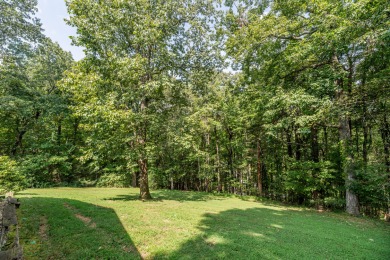 Beautiful home nestled among mature trees giving just enough on Emory Golf and Country Club in Tennessee - for sale on GolfHomes.com, golf home, golf lot