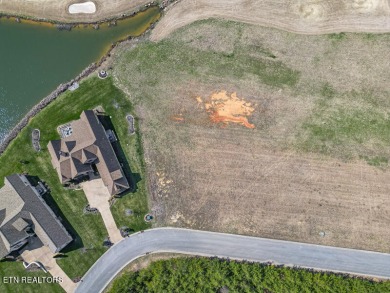 Discover unparalleled beauty within WindRiver Golf and Lakefront on Wind River Golf Course in Tennessee - for sale on GolfHomes.com, golf home, golf lot