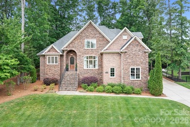 Beautifully updated and impeccably maintained, this custom brick on Cowans Ford Country Club in North Carolina - for sale on GolfHomes.com, golf home, golf lot