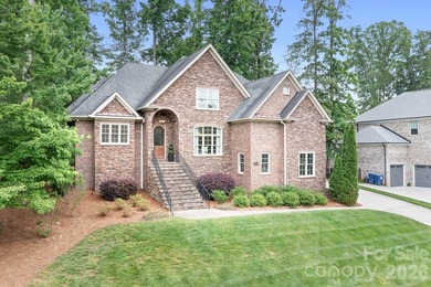 Beautifully updated and impeccably maintained, this custom brick on Cowans Ford Country Club in North Carolina - for sale on GolfHomes.com, golf home, golf lot