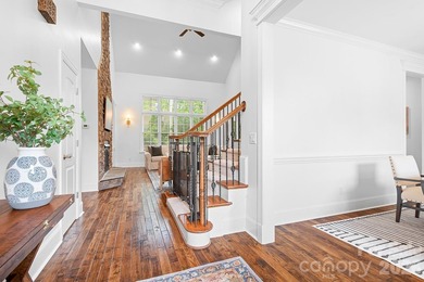 Beautifully updated and impeccably maintained, this custom brick on Cowans Ford Country Club in North Carolina - for sale on GolfHomes.com, golf home, golf lot