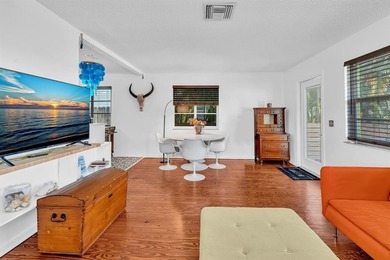 Welcome to your slice of Old Florida charm! This quaint concrete on Lake Worth Municipal Golf Course in Florida - for sale on GolfHomes.com, golf home, golf lot