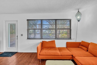 Welcome to your slice of Old Florida charm! This quaint concrete on Lake Worth Municipal Golf Course in Florida - for sale on GolfHomes.com, golf home, golf lot