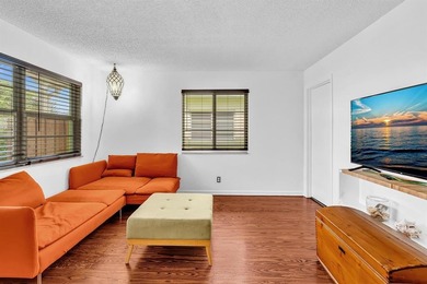 Welcome to your slice of Old Florida charm! This quaint concrete on Lake Worth Municipal Golf Course in Florida - for sale on GolfHomes.com, golf home, golf lot