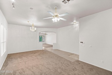 Step into this warm and welcoming, meticulously maintained home on Estrella Mountain Ranch Golf Course in Arizona - for sale on GolfHomes.com, golf home, golf lot