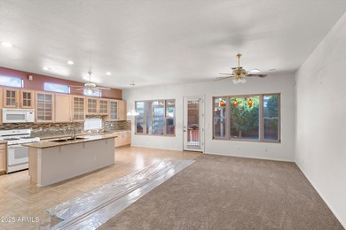 Step into this warm and welcoming, meticulously maintained home on Estrella Mountain Ranch Golf Course in Arizona - for sale on GolfHomes.com, golf home, golf lot