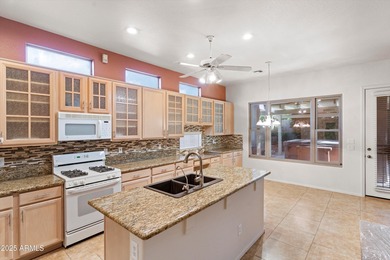 Step into this warm and welcoming, meticulously maintained home on Estrella Mountain Ranch Golf Course in Arizona - for sale on GolfHomes.com, golf home, golf lot