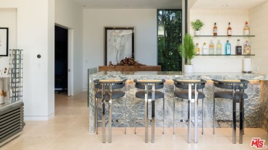 Nestled in the highly sought-after Riviera neighborhood of on Riviera Country Club in California - for sale on GolfHomes.com, golf home, golf lot