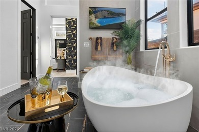 Luxuriate in the only 4000 sq ft SINGLE STORY Lake Las Vegas on Reflection Bay Golf Club in Nevada - for sale on GolfHomes.com, golf home, golf lot