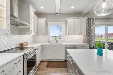 Welcome to this exceptional home in the sought-after Macatawa on The Macatwa Legends Golf Course in Michigan - for sale on GolfHomes.com, golf home, golf lot
