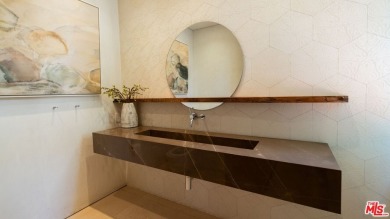 Nestled in the highly sought-after Riviera neighborhood of on Riviera Country Club in California - for sale on GolfHomes.com, golf home, golf lot