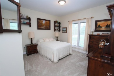 This is a rare find.  2102 square foot one story villa over on Carrington Golf Club in Michigan - for sale on GolfHomes.com, golf home, golf lot