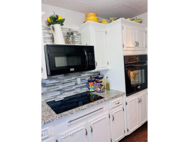 Can you say curb appeal? Come take a look at this charming gem on Comanche Trail Golf Course in Texas - for sale on GolfHomes.com, golf home, golf lot